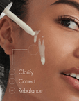 Woman applying skincare product to her face with text 'Clarify', 'Correct', 'Rebalance'.
