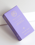 Purple packaging of Bella Aura product on a white background