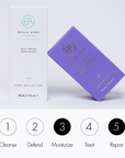 Purple bella aura skincare product and packaging with Bella Aura branding on a light gray background.