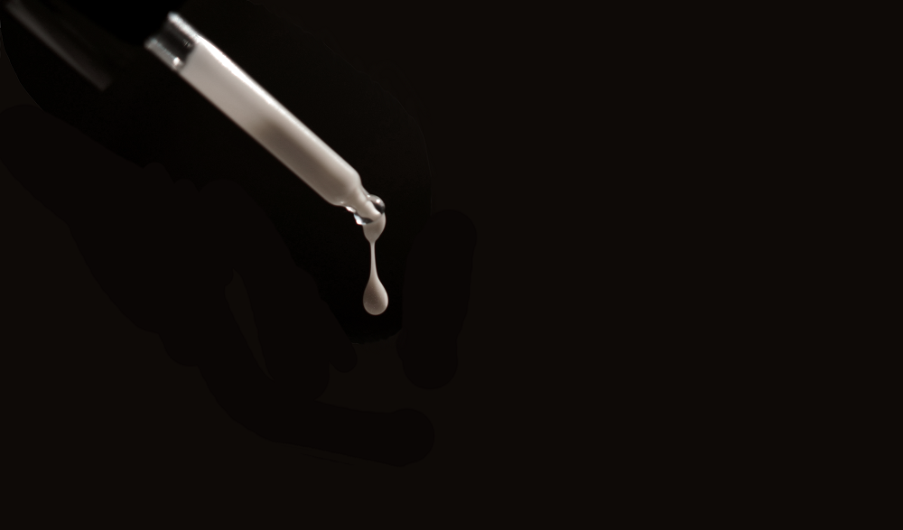 dropper with texture in a black background