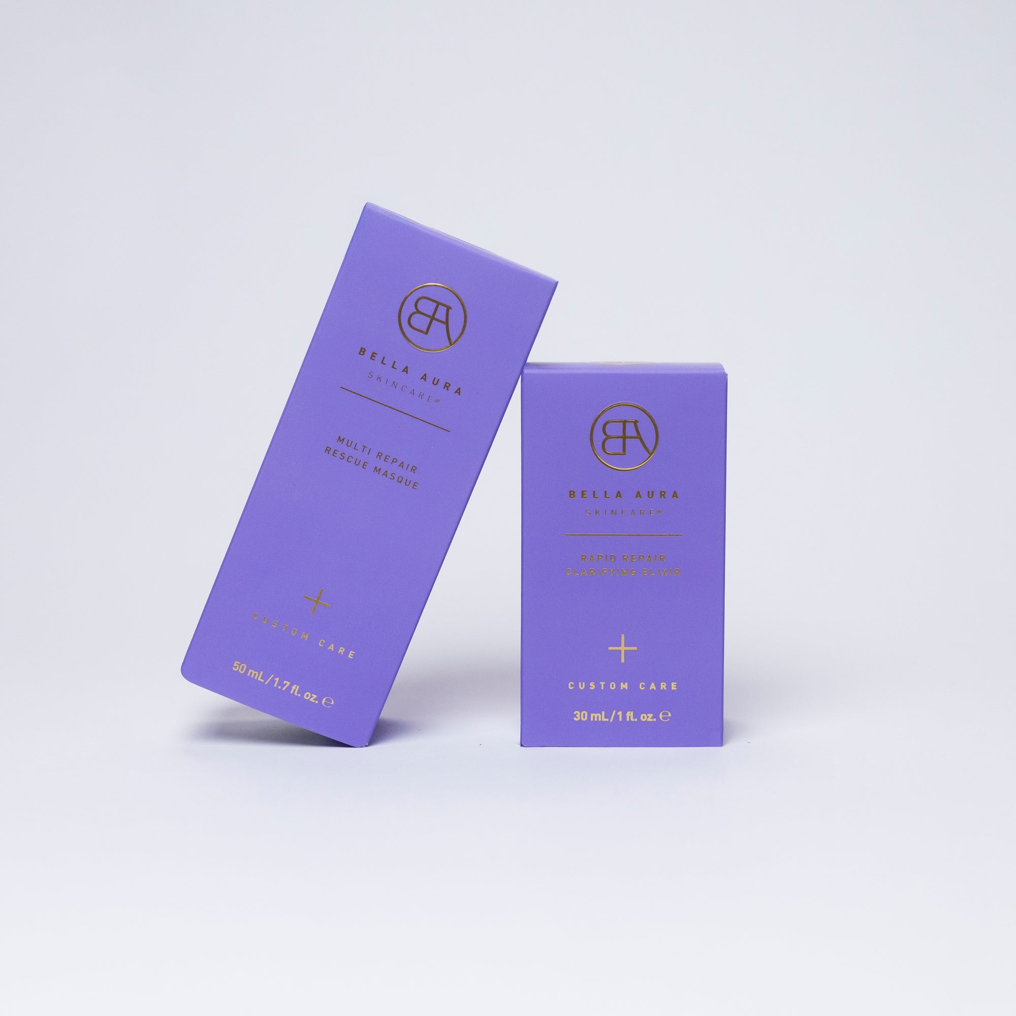 Two purple boxes with a brand logo on a light purple background