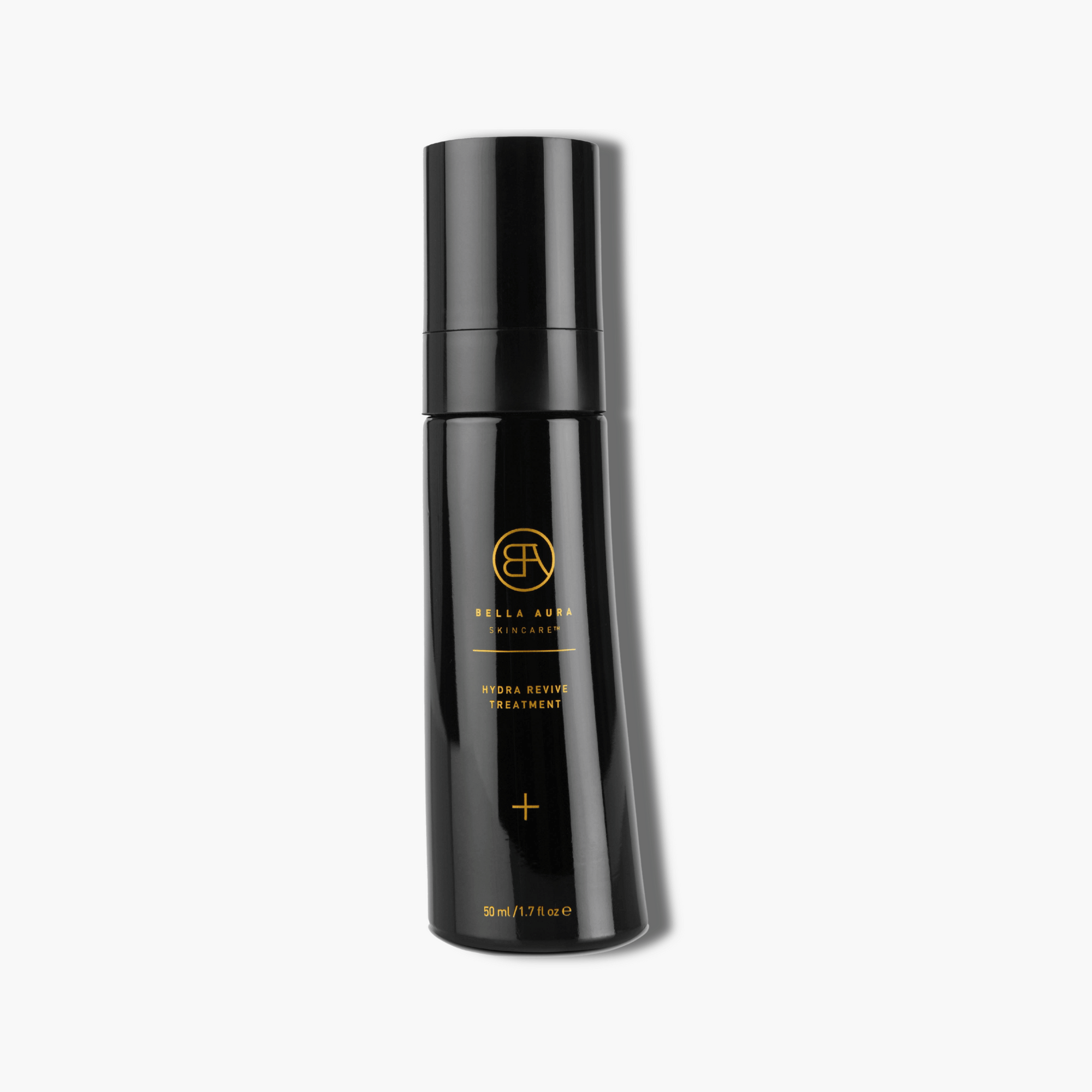 Black skincare bottle with gold text on a white background